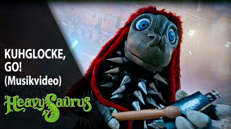 Video link: Heavysaurus – Kuhglocke, Go! (Offizielles Musikvideo) | Dino Metal für die ganze Familie